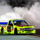 Matt Crafton does a celebratory burnout after winning the NASCAR Truck Series championship at Homestead-Miami Speedway.